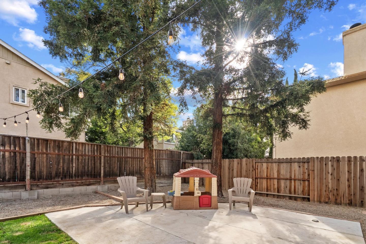 56 Lavender Court Tracy, CA 95376 - Photo 36 of 56 a backyard of a house with table and chairs