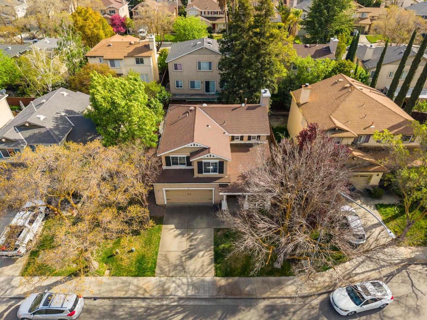 56 Lavender Court Tracy, CA 95376 - Photo 42 of 56 an aerial view of a house with garden space and street view