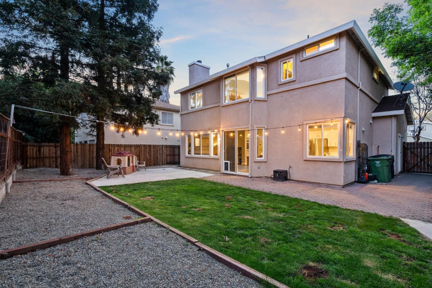 56 Lavender Court Tracy, CA 95376 - Photo 49 of 56 a front view of a house with a yard and table and chairs