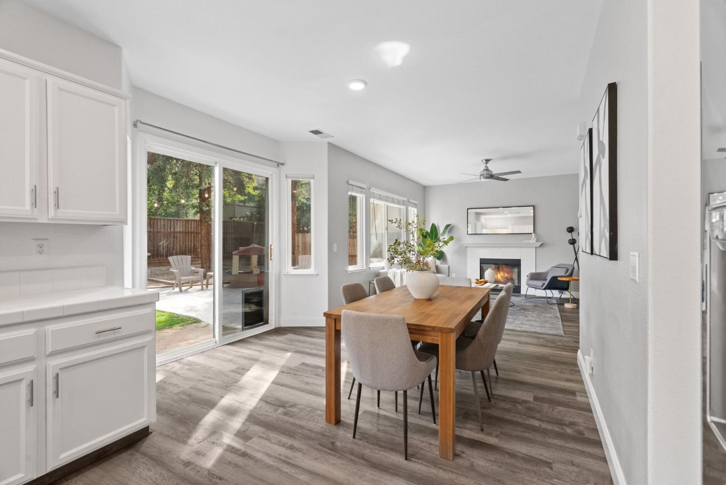 56 Lavender Court Tracy, CA 95376 - Photo 7 of 56 a dining room with furniture and a floor to ceiling window