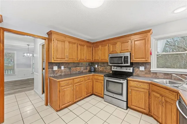 $429,000 | 3715 Southwest Kimstin Circle, Blue Springs, MO 64015