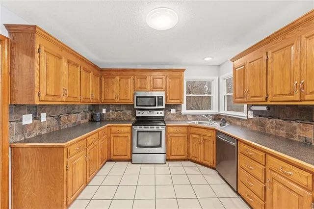 $429,000 | 3715 Southwest Kimstin Circle, Blue Springs, MO 64015