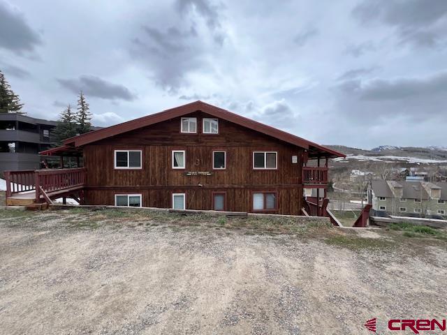 31 Castle Road, Unit 5 Crested Butte, CO 81225 - Photo 20 of 24 a view of a house with a yard