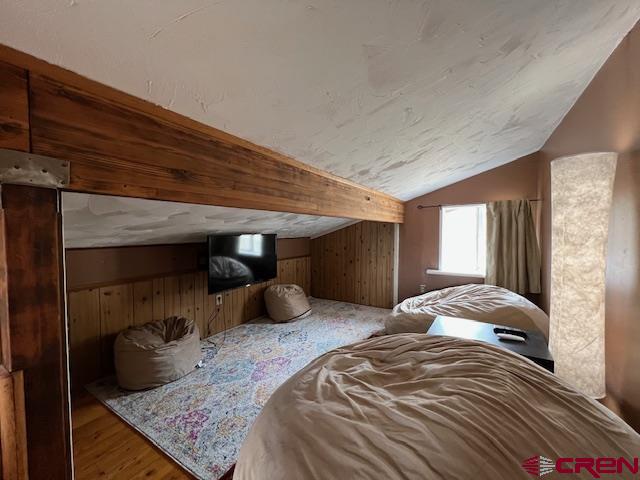 31 Castle Road, Unit 5 Crested Butte, CO 81225 - Photo 21 of 24 a bed sitting in a bedroom next to a window