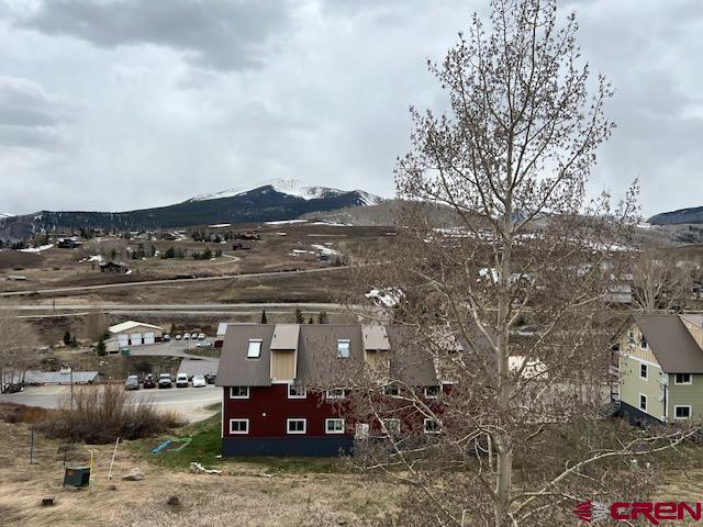 31 Castle Road, Unit 5 Crested Butte, CO 81225 - Photo 3 of 24 a view of a big house with cars parked