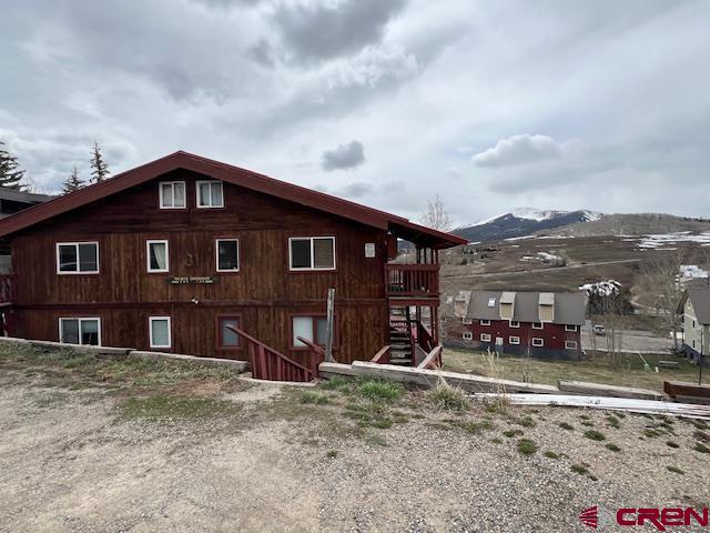 31 Castle Road, Unit 5 Crested Butte, CO 81225 - Photo 4 of 24 a view of a house with a yard