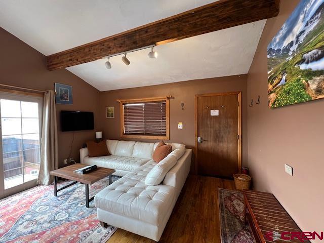 31 Castle Road, Unit 5 Crested Butte, CO 81225 - Photo 5 of 24 a living room with furniture and a rug