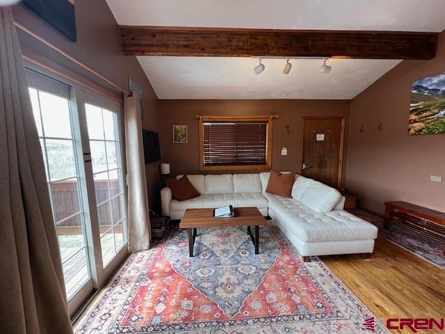 31 Castle Road, Unit 5 Crested Butte, CO 81225 - Photo 6 of 24 a living room with furniture and a rug