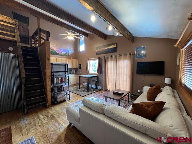 31 Castle Road, Unit 5 Crested Butte, CO 81225 - Photo 8 of 24 a living room with furniture and a flat screen tv