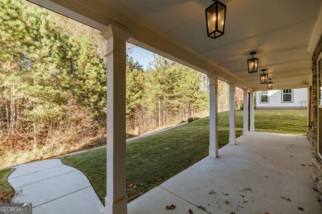a view of a porch in front of a house