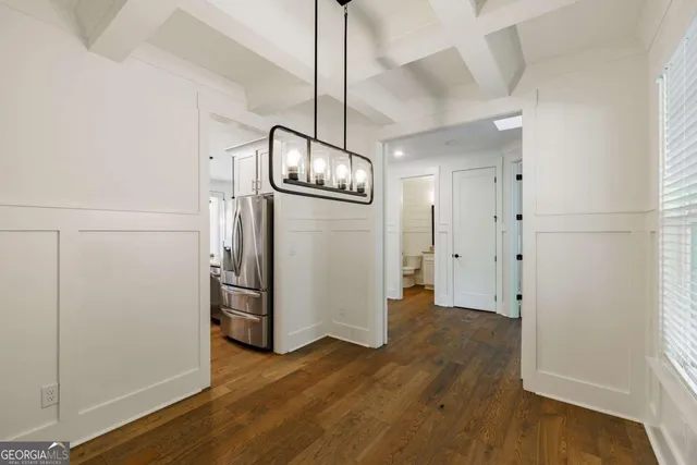 a view of entryway with wooden floor