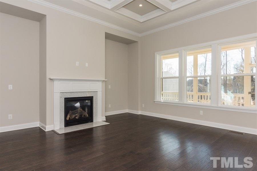 8121 Greys Landing Way, Unit 10 Raleigh, NC 27615 - Photo 6 of 14 Sample photo showcasing optional stone fireplace