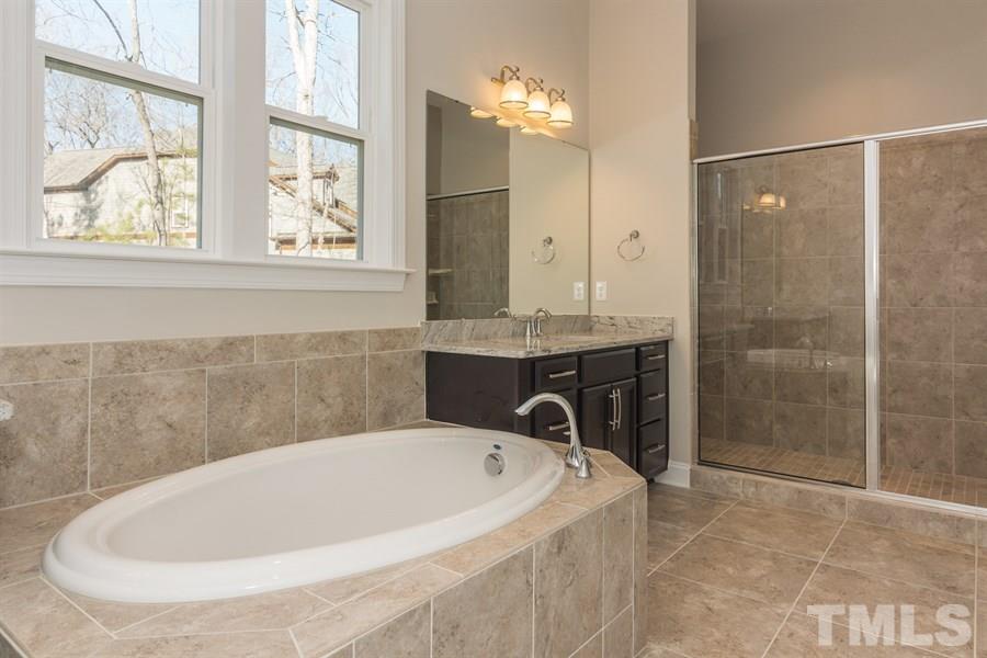 8121 Greys Landing Way, Unit 10 Raleigh, NC 27615 - Photo 9 of 14 Sample photo of sap like bath that includes dual & separate vanities