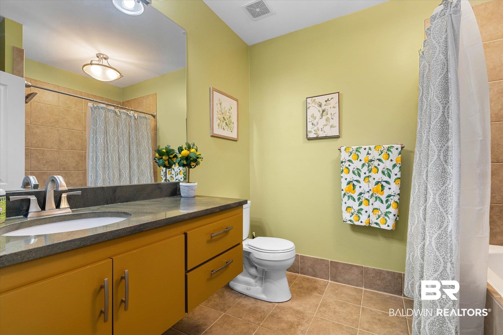 3400 Rue Royal Mobile, AL 36693 - Photo 22 of 33 Full bathroom with vanity, tile patterned floors, and curtained shower
