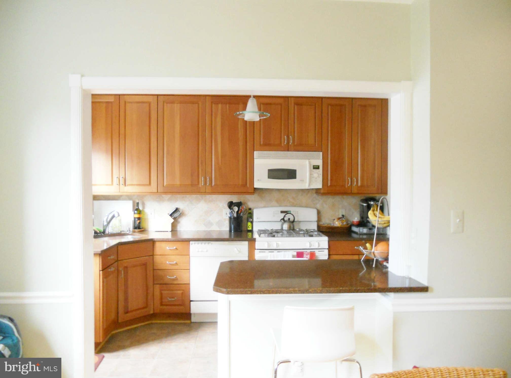 113 Dunkirk Road Baltimore, MD 21212 - Photo 6 of 16 Kitchen open to Dining Room