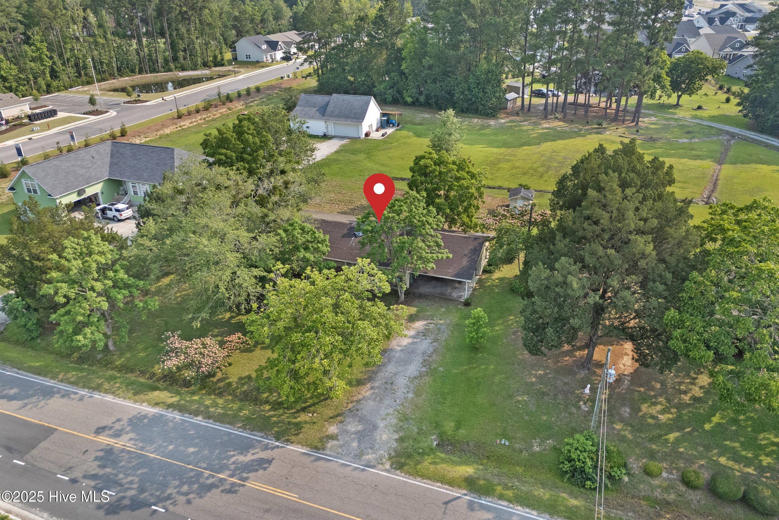 670 Calabash Road Northwest Calabash, NC 28467 - Photo 26 of 28 Red pin indicates where the single wide manufactured home is