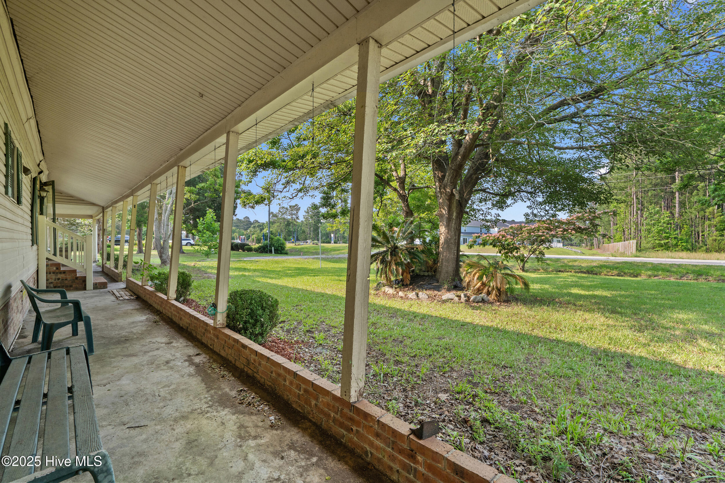 670 Calabash Road Northwest Calabash, NC 28467 - Photo 3 of 28 Front Covered Porch