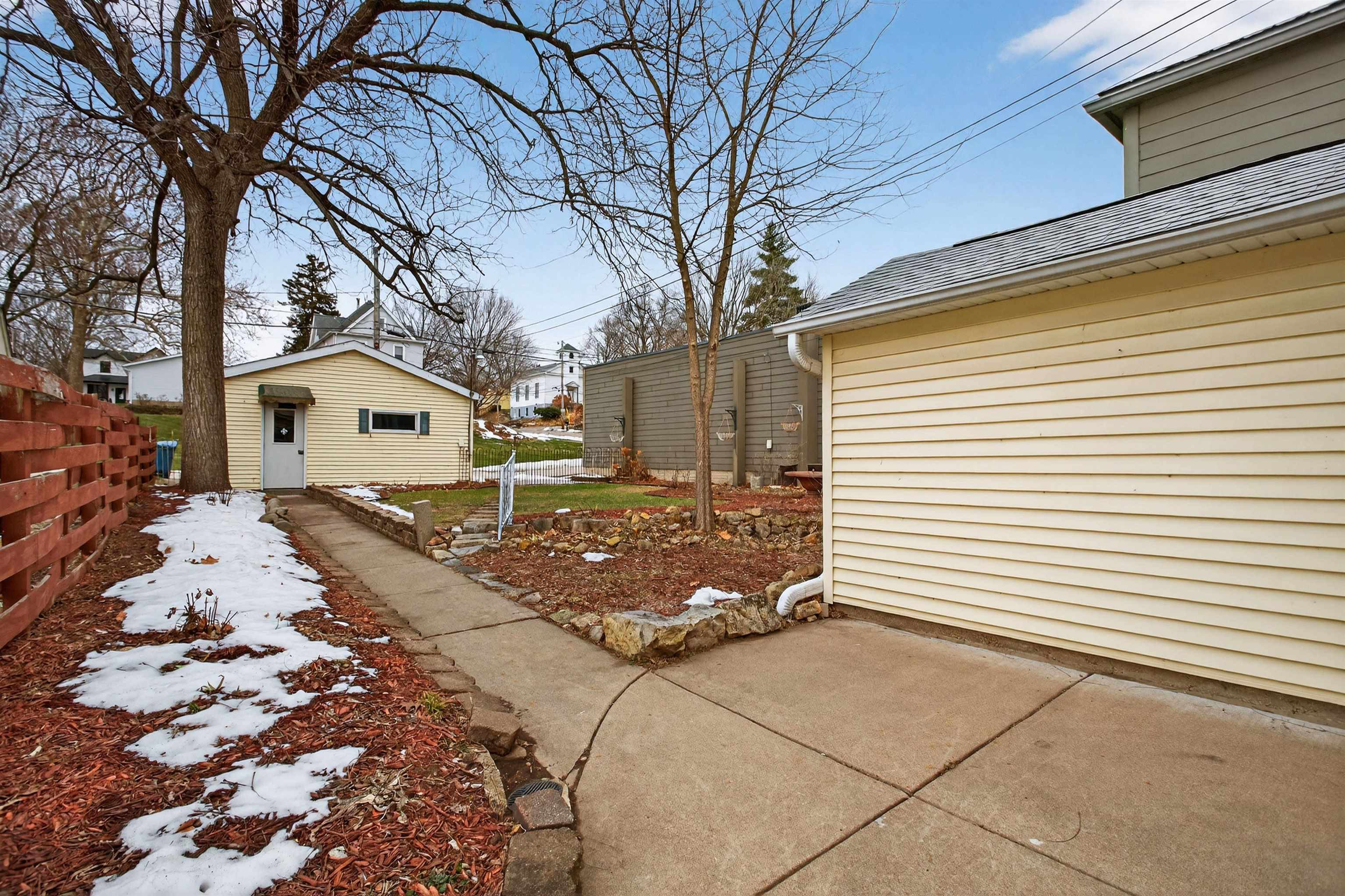 118 North Cody Road Leclaire, IA 52753 - Photo 11 of 42 a view of a house with a backyard