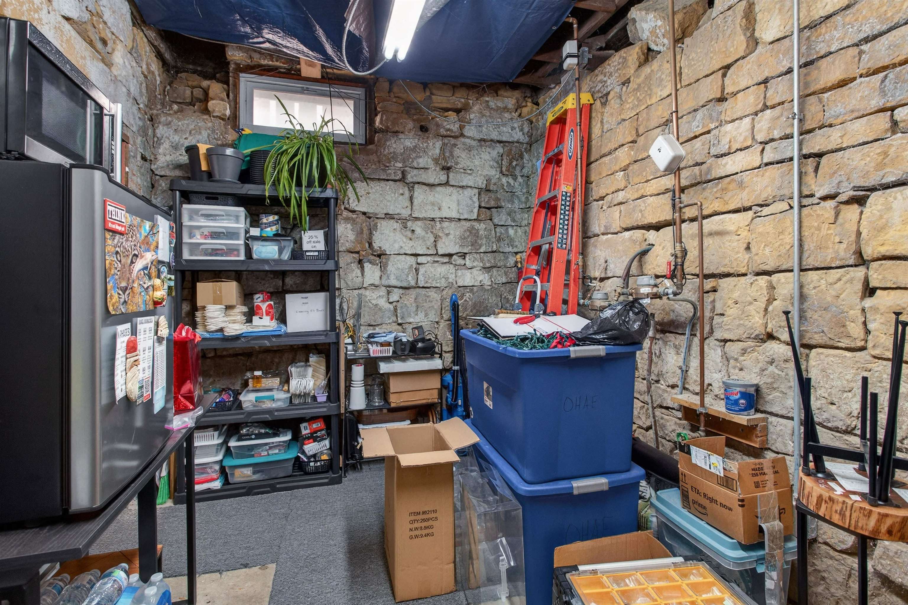 118 North Cody Road Leclaire, IA 52753 - Photo 20 of 42 a view of storage and utility room