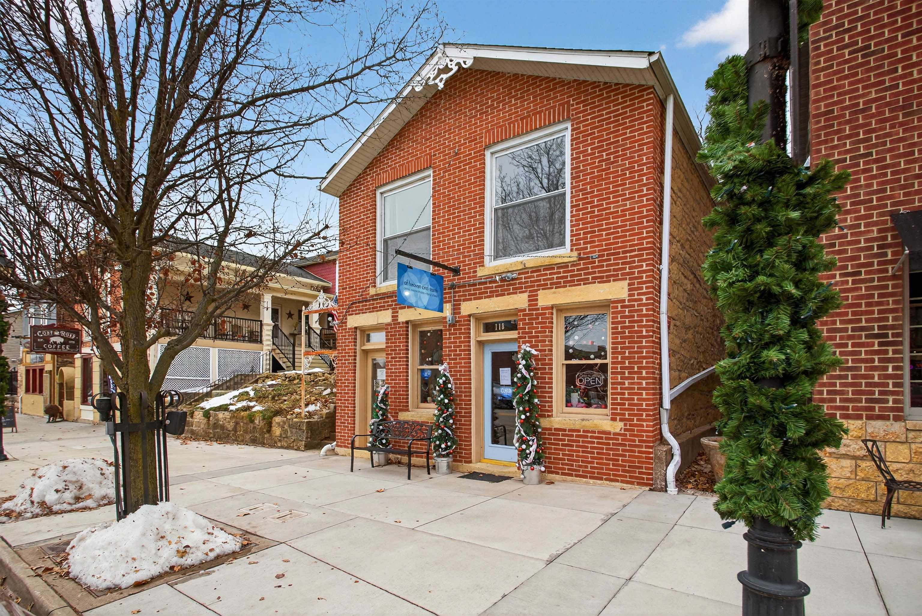 118 North Cody Road Leclaire, IA 52753 - Photo 2 of 42 a view of a house with a patio