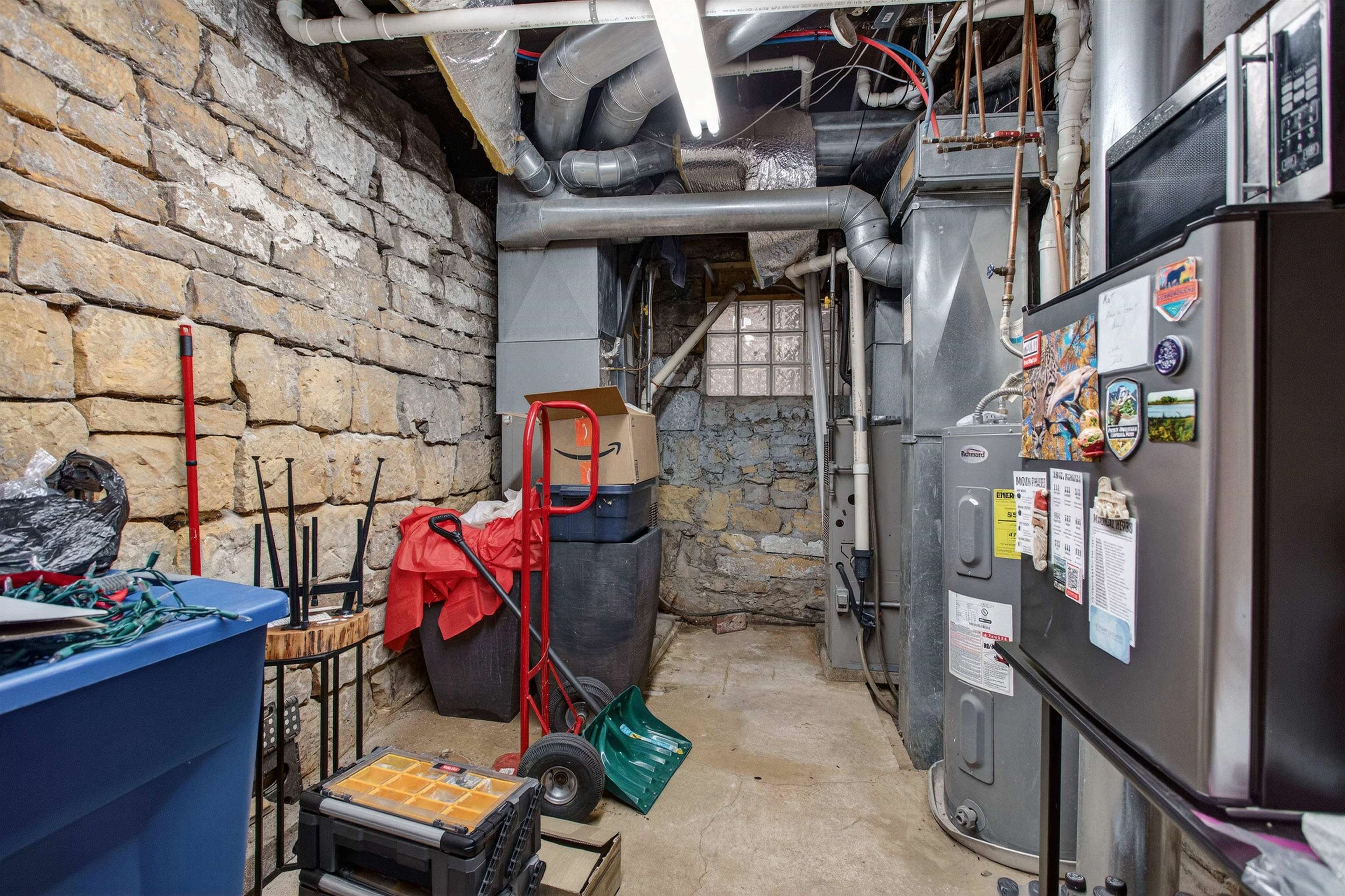 118 North Cody Road Leclaire, IA 52753 - Photo 22 of 42 a view of storage and utility room