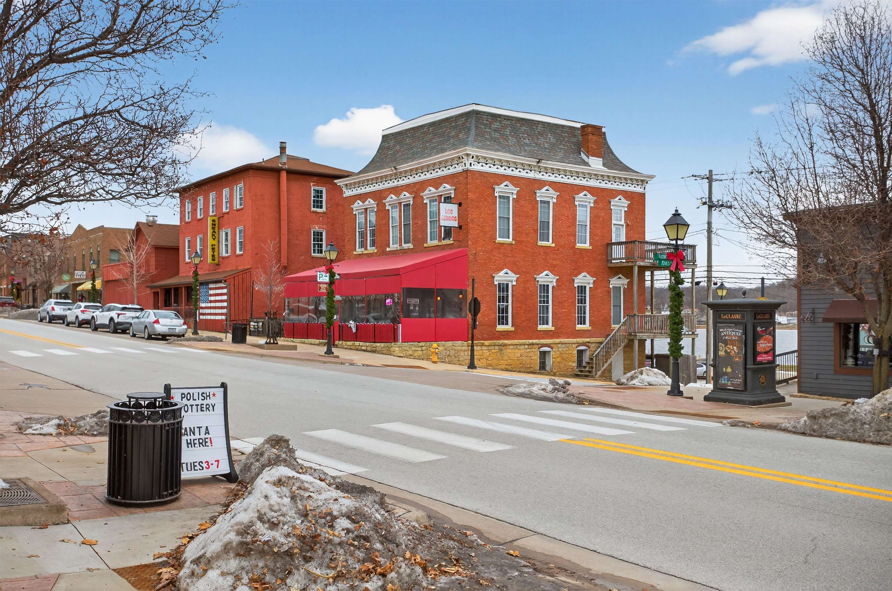118 North Cody Road Leclaire, IA 52753 - Photo 6 of 42 a view of a building with a street