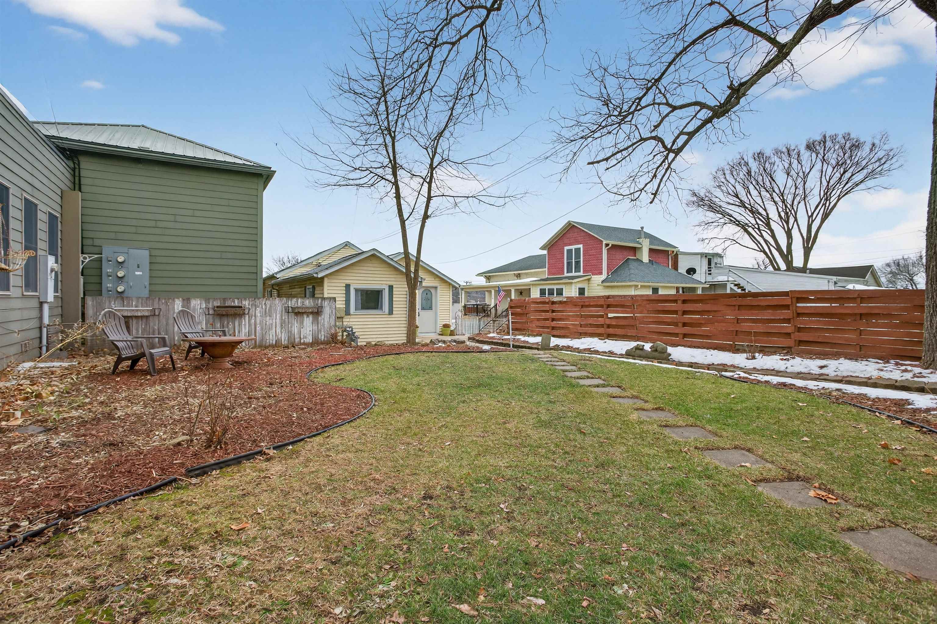 118 North Cody Road Leclaire, IA 52753 - Photo 9 of 42 a view of house with outdoor space