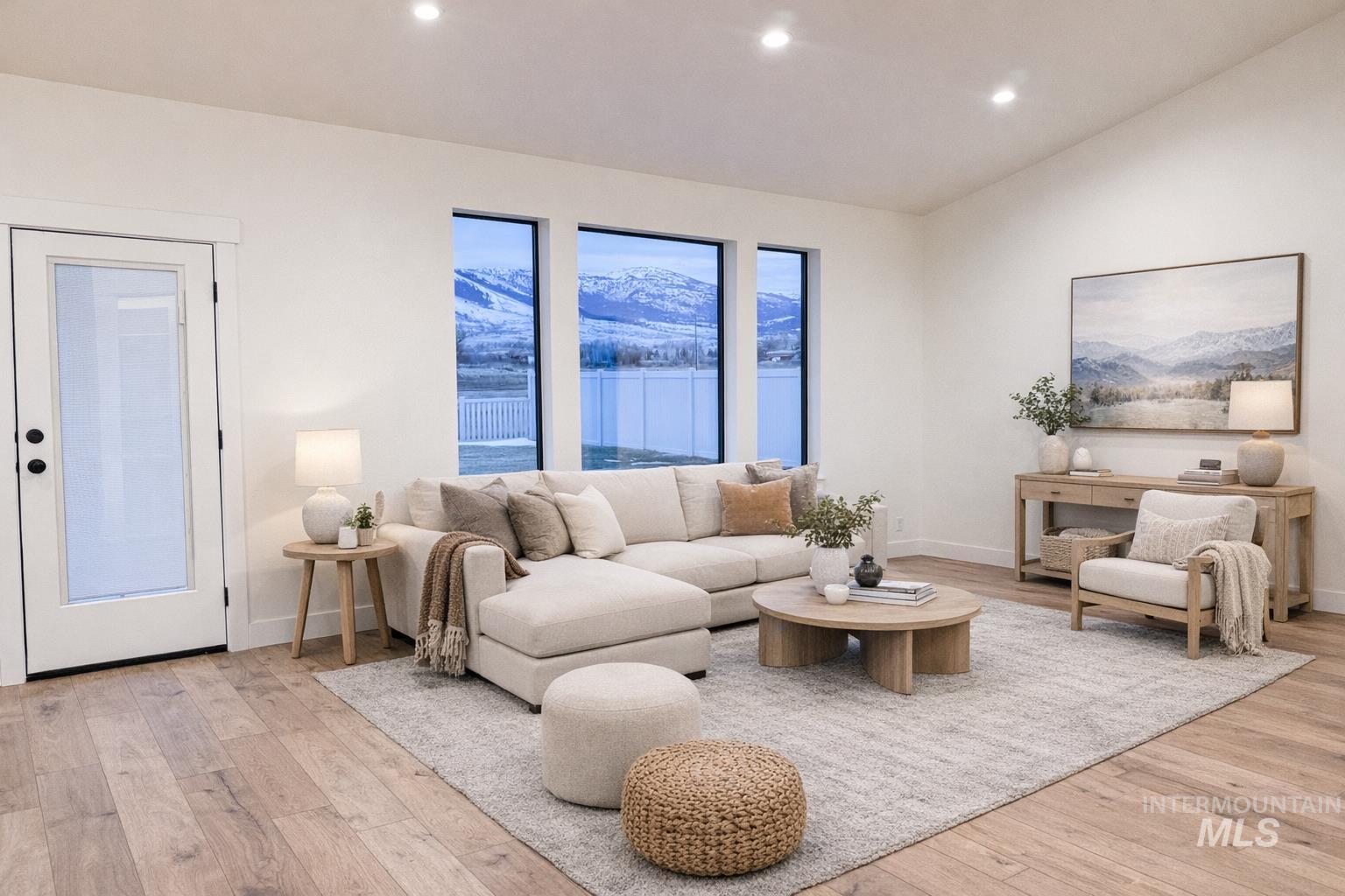 235 Whitman Street Albion, ID 83311 - Photo 3 of 23 Living room featuring recessed lighting, light wood-style flooring, and lofted ceiling