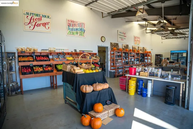 a view of a building with car parked