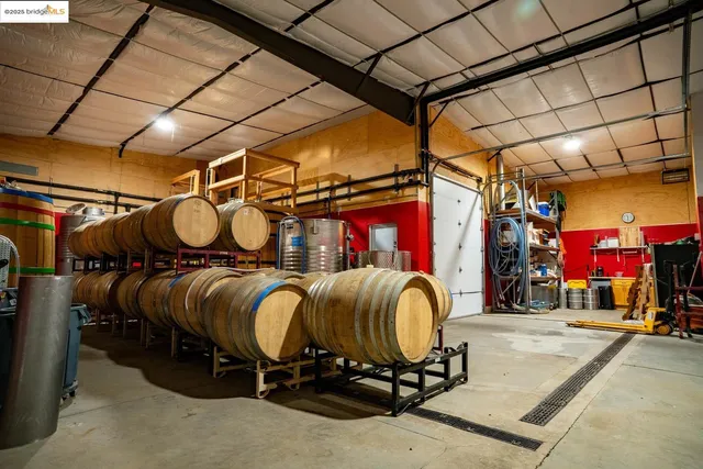 an aerial view of a pool table and chairs