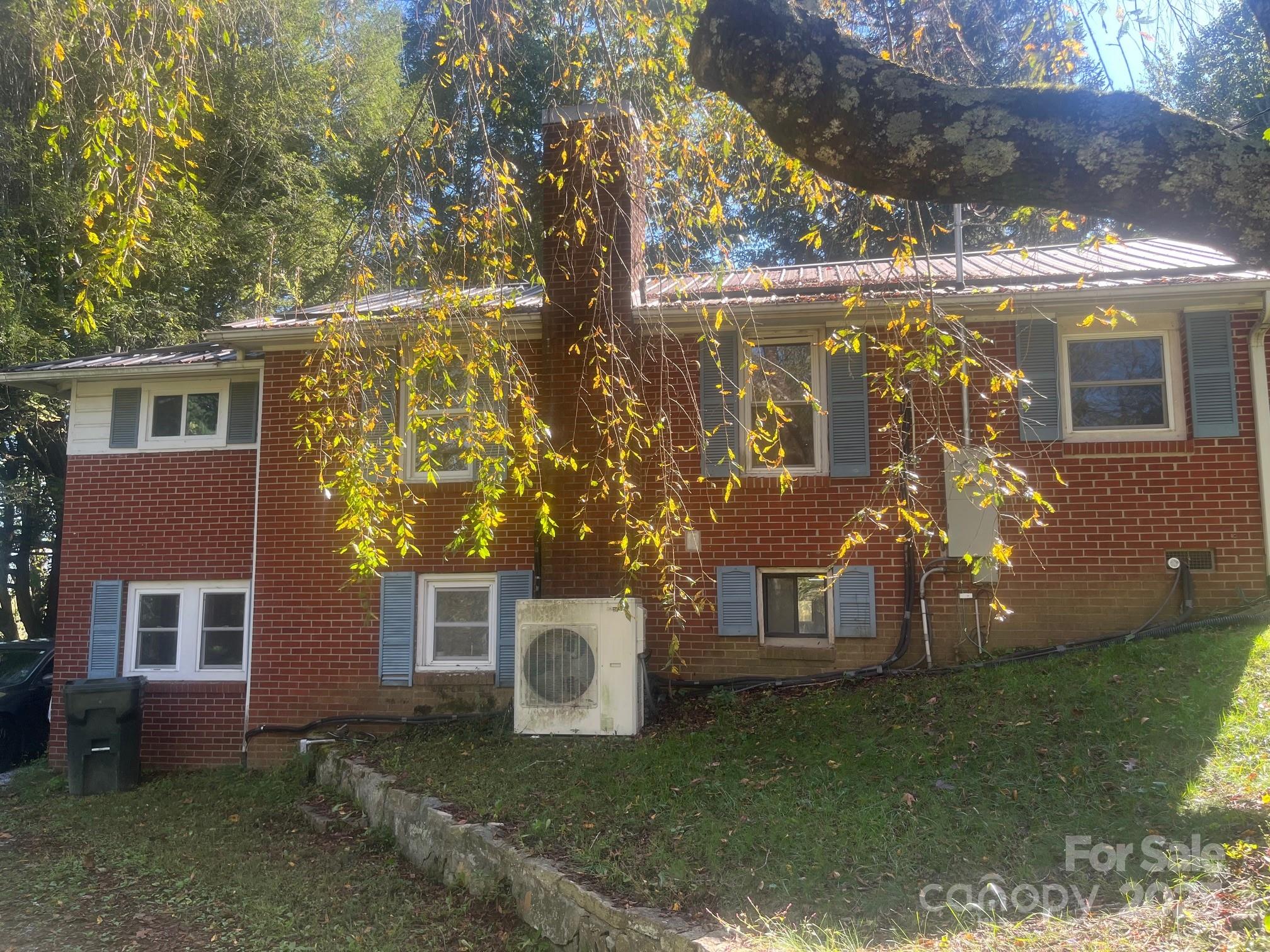 677 Mt Olivet Road Zirconia, NC 28790 - Photo 2 of 16 a view of a house with backyard