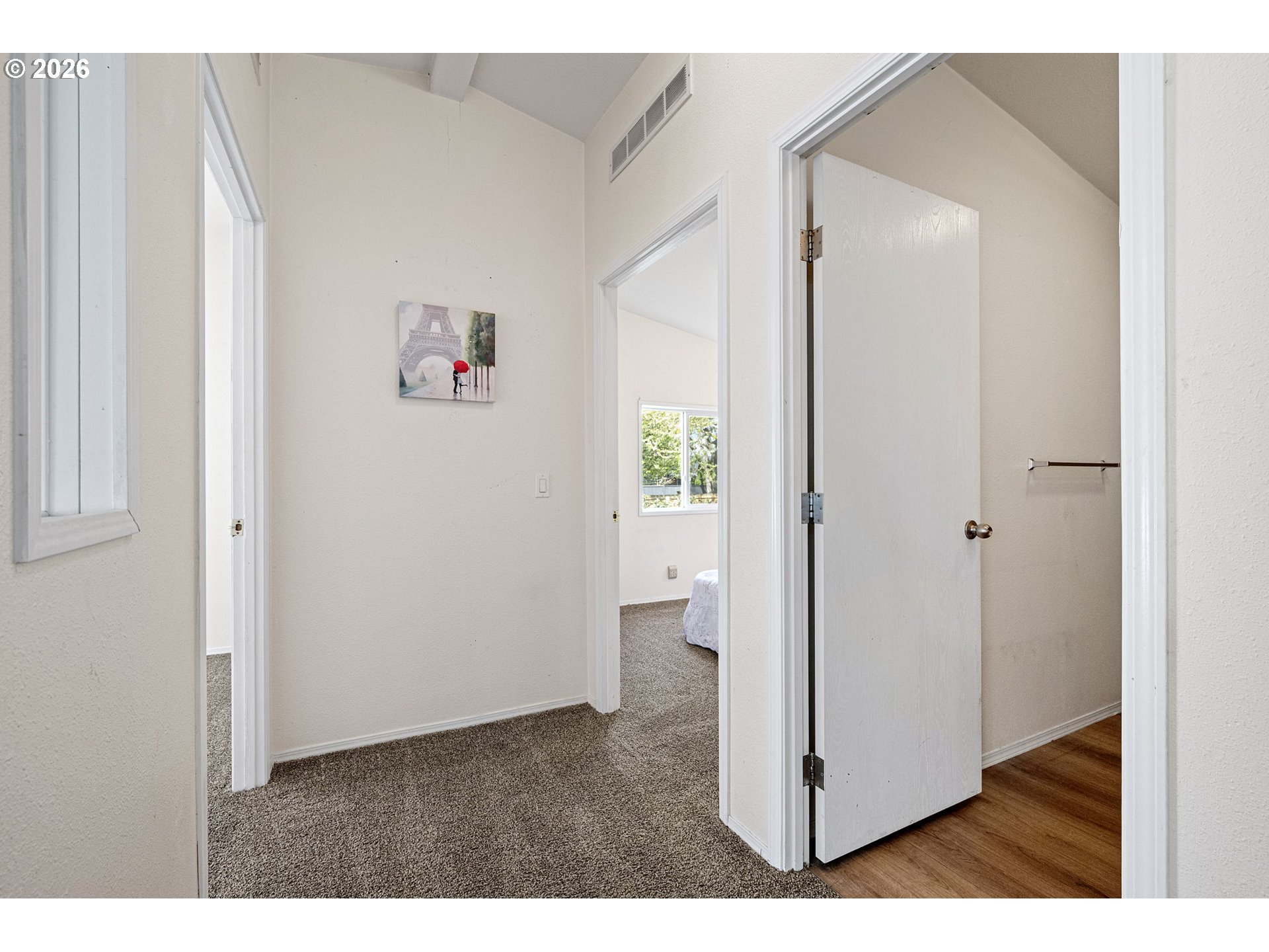 1699 North Terry Street, Unit 320 Eugene, OR 97402 - Photo 22 of 36 a view of a hallway with wooden floor and closet