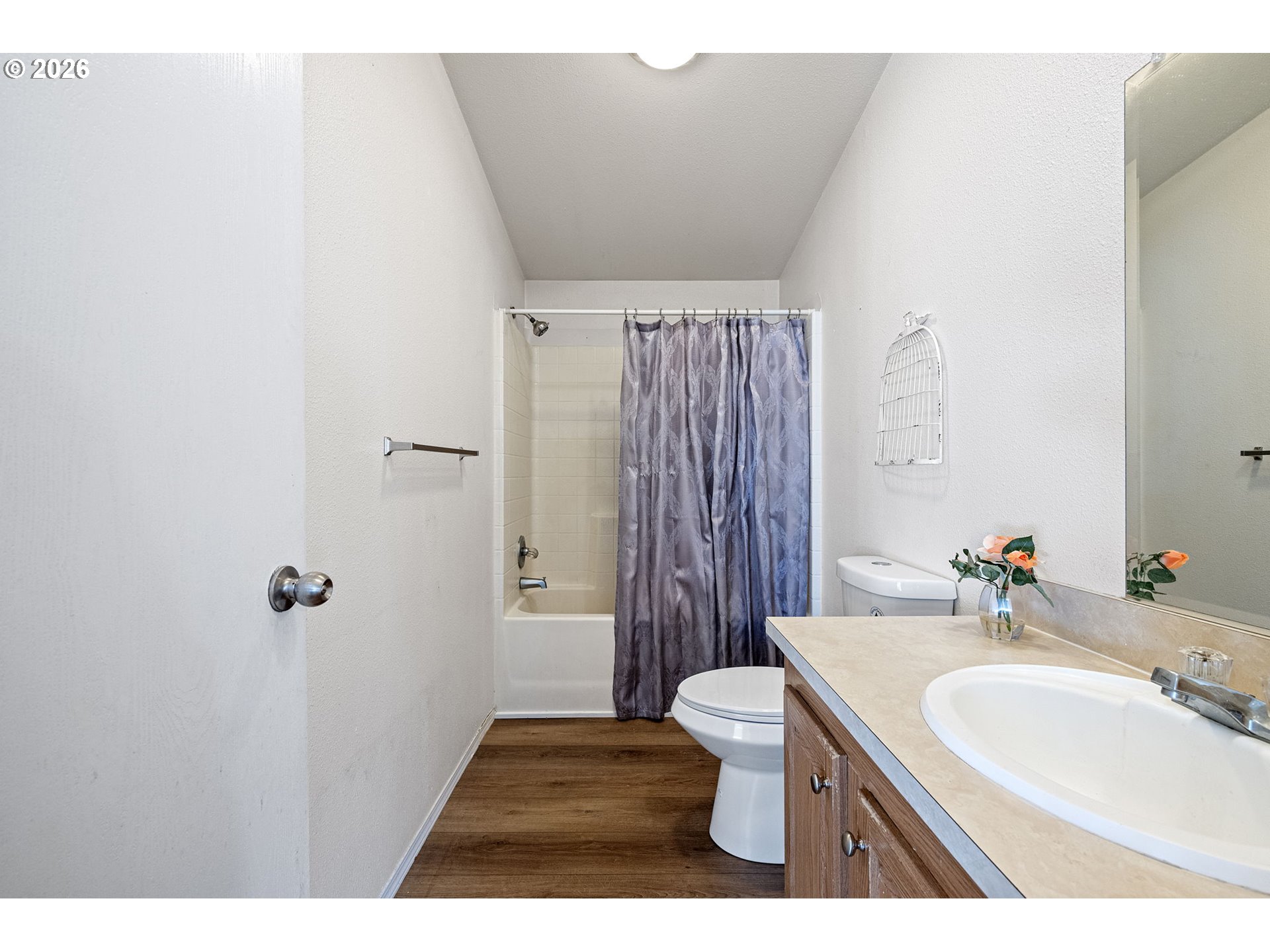 1699 North Terry Street, Unit 320 Eugene, OR 97402 - Photo 25 of 36 a bathroom with a sink toilet and shower
