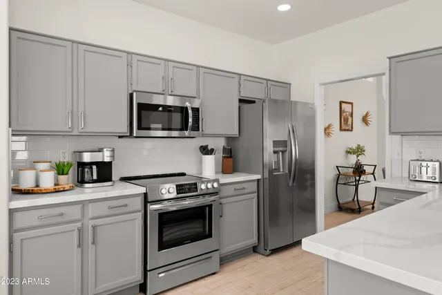 a bedroom with furniture and flat screen tv