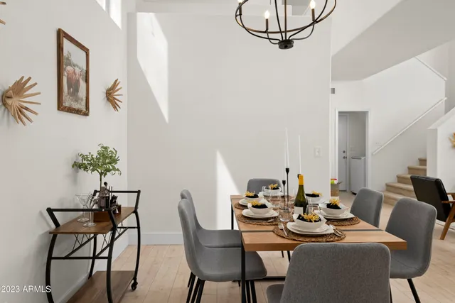 a bathroom with a shower sink and mirror
