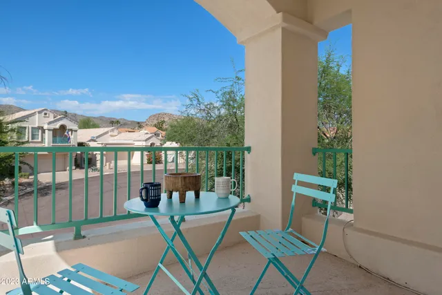 a view of a swimming pool with a yard
