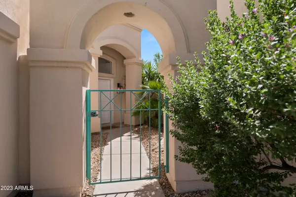 a living room with furniture and a painting