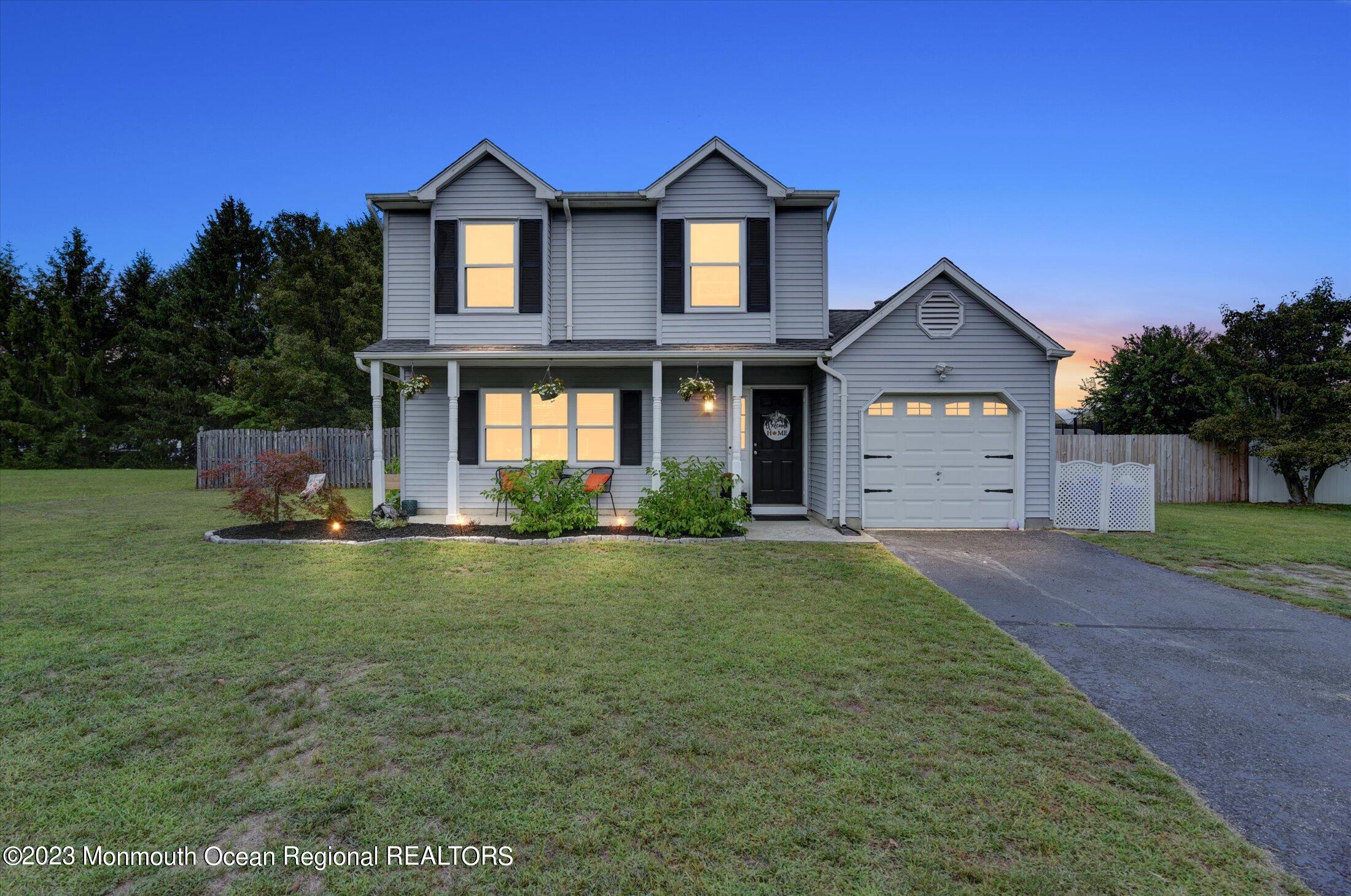 3 Albatross Drive Howell, NJ 07731 - Photo 1 of 29 a front view of a house with a yard and garage