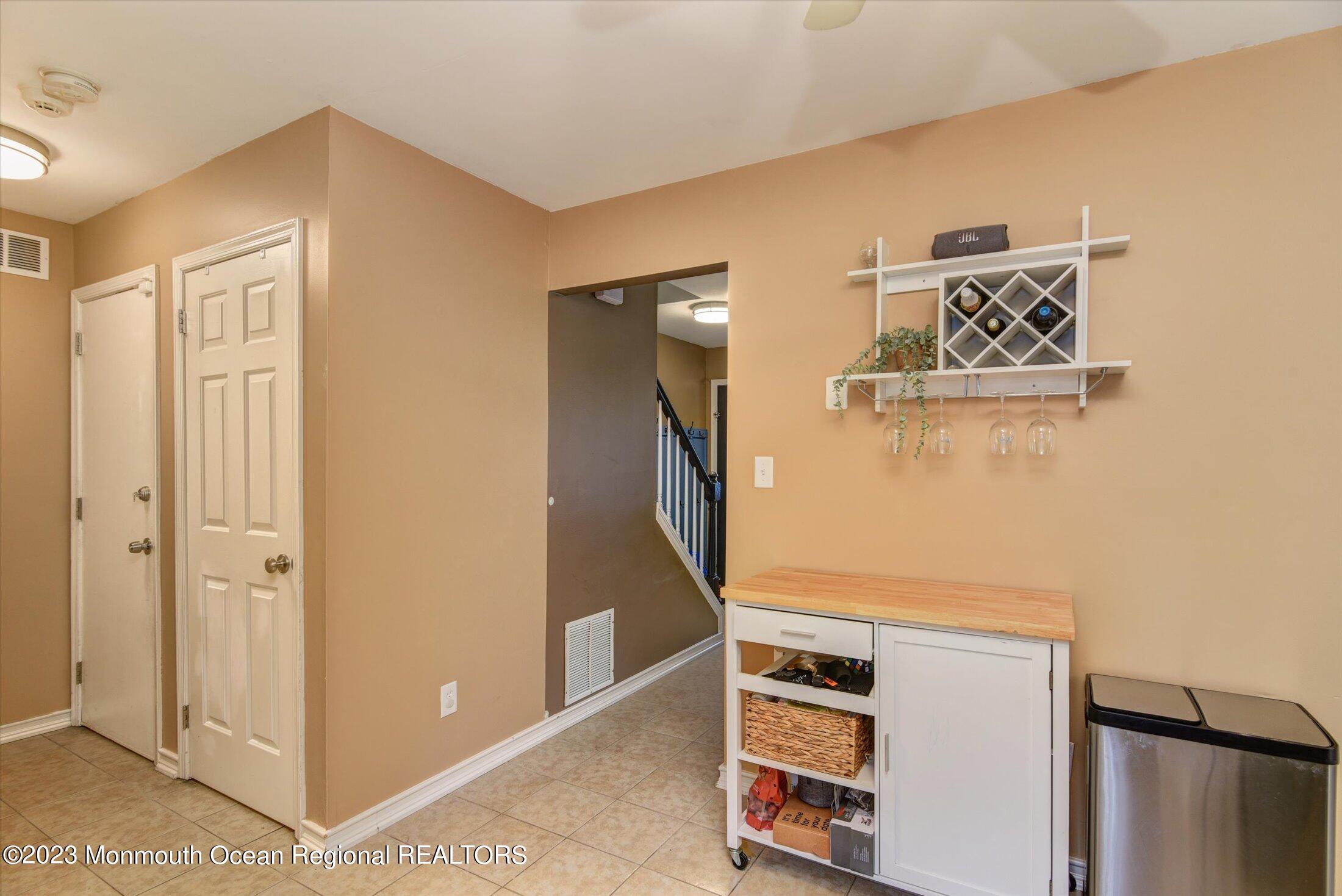 3 Albatross Drive Howell, NJ 07731 - Photo 15 of 29 a view of an empty room with bathroom and wooden floor