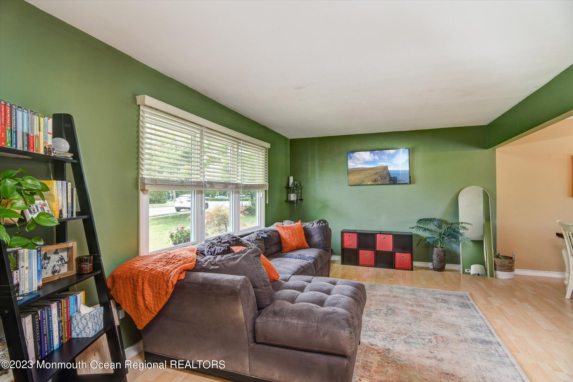 3 Albatross Drive Howell, NJ 07731 - Photo 6 of 29 a living room with furniture and a potted plant