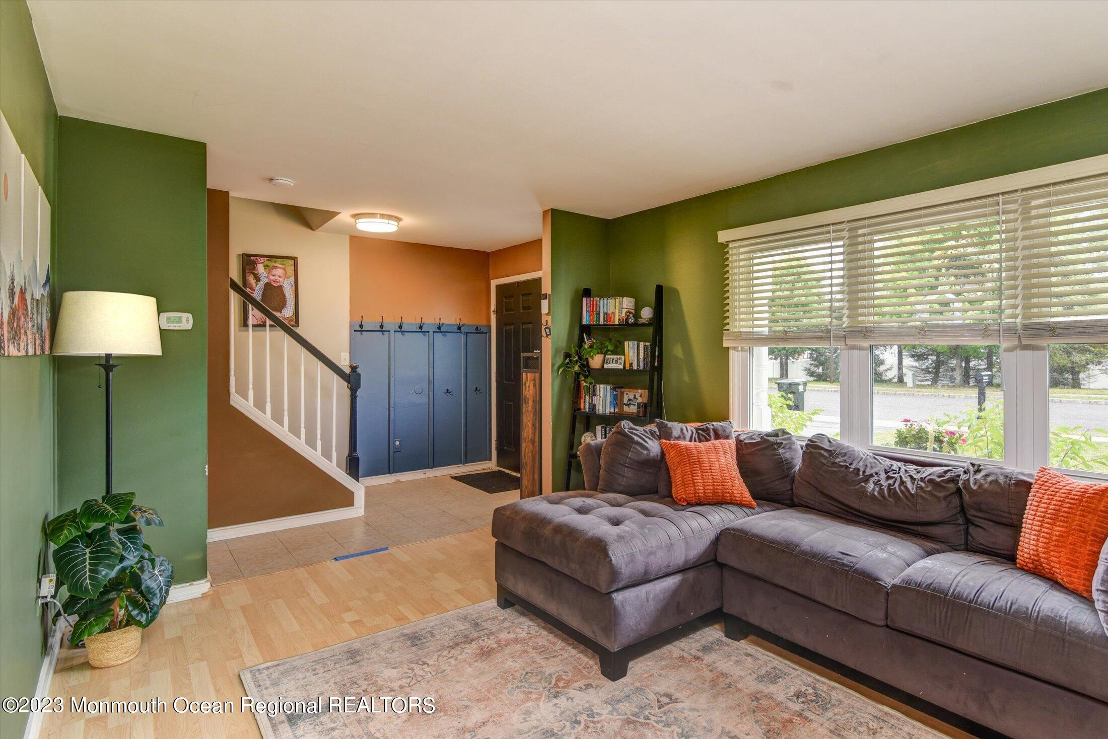 3 Albatross Drive Howell, NJ 07731 - Photo 7 of 29 a living room with furniture and a large window
