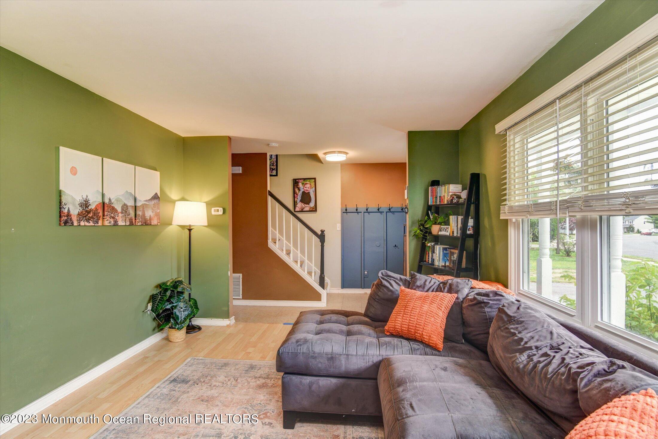 3 Albatross Drive Howell, NJ 07731 - Photo 9 of 29 a living room with furniture and a large window