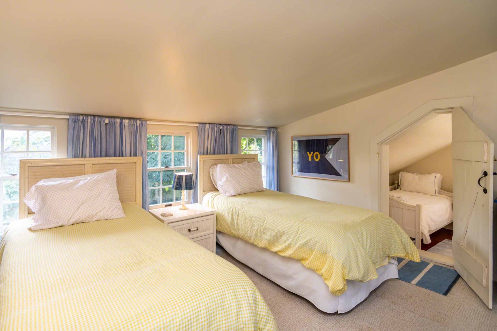 10 Peases Point Way North Edgartown, MA 02539 - Photo 28 of 45 a bedroom with a bed and a night stand