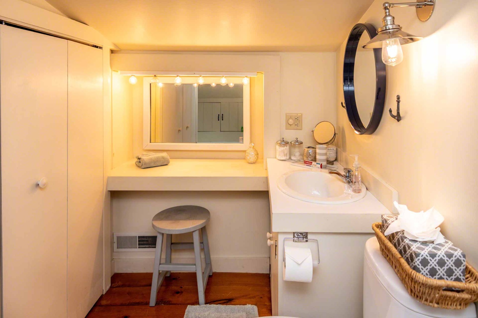 10 Peases Point Way North Edgartown, MA 02539 - Photo 30 of 45 a bathroom with a sink and a mirror