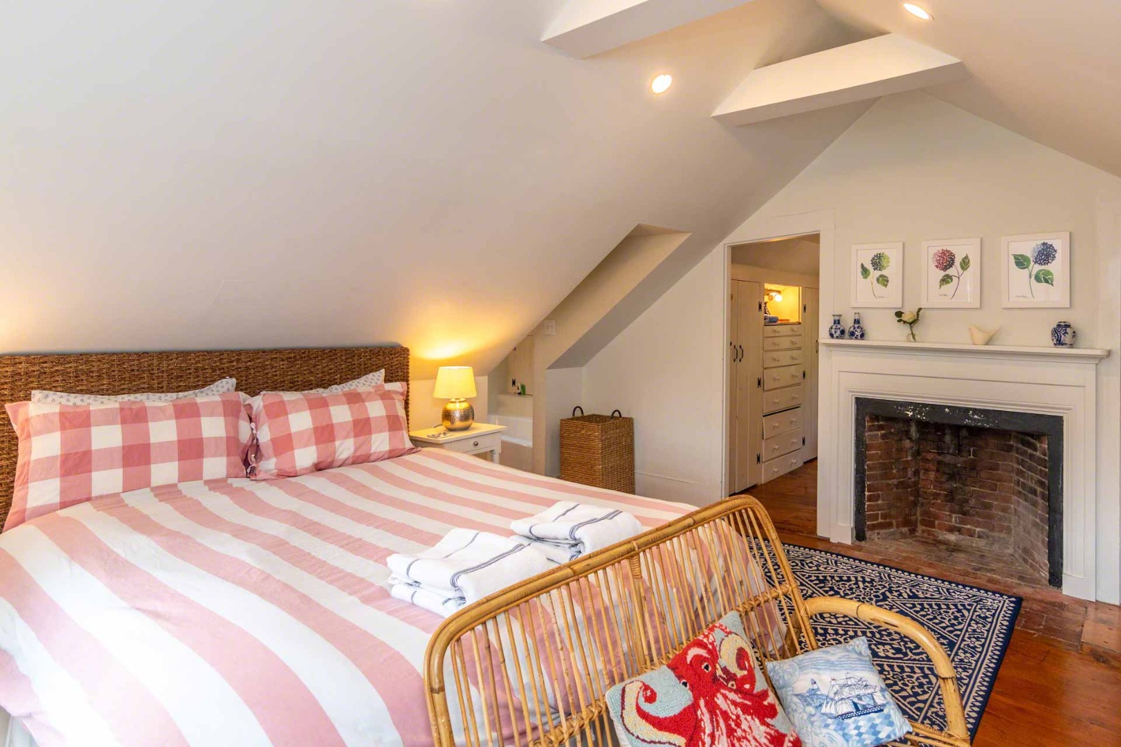 10 Peases Point Way North Edgartown, MA 02539 - Photo 34 of 45 a bedroom with a bed and a fireplace