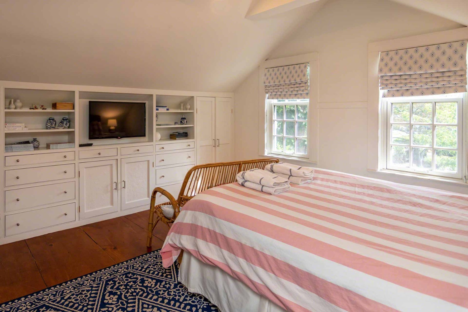 10 Peases Point Way North Edgartown, MA 02539 - Photo 35 of 45 a bedroom with a bed and a flat screen tv