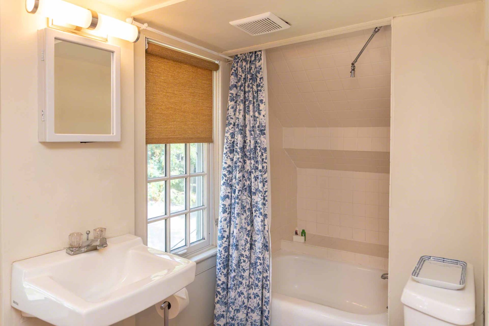 10 Peases Point Way North Edgartown, MA 02539 - Photo 36 of 45 a bathroom with a bathtub a sink and a shower