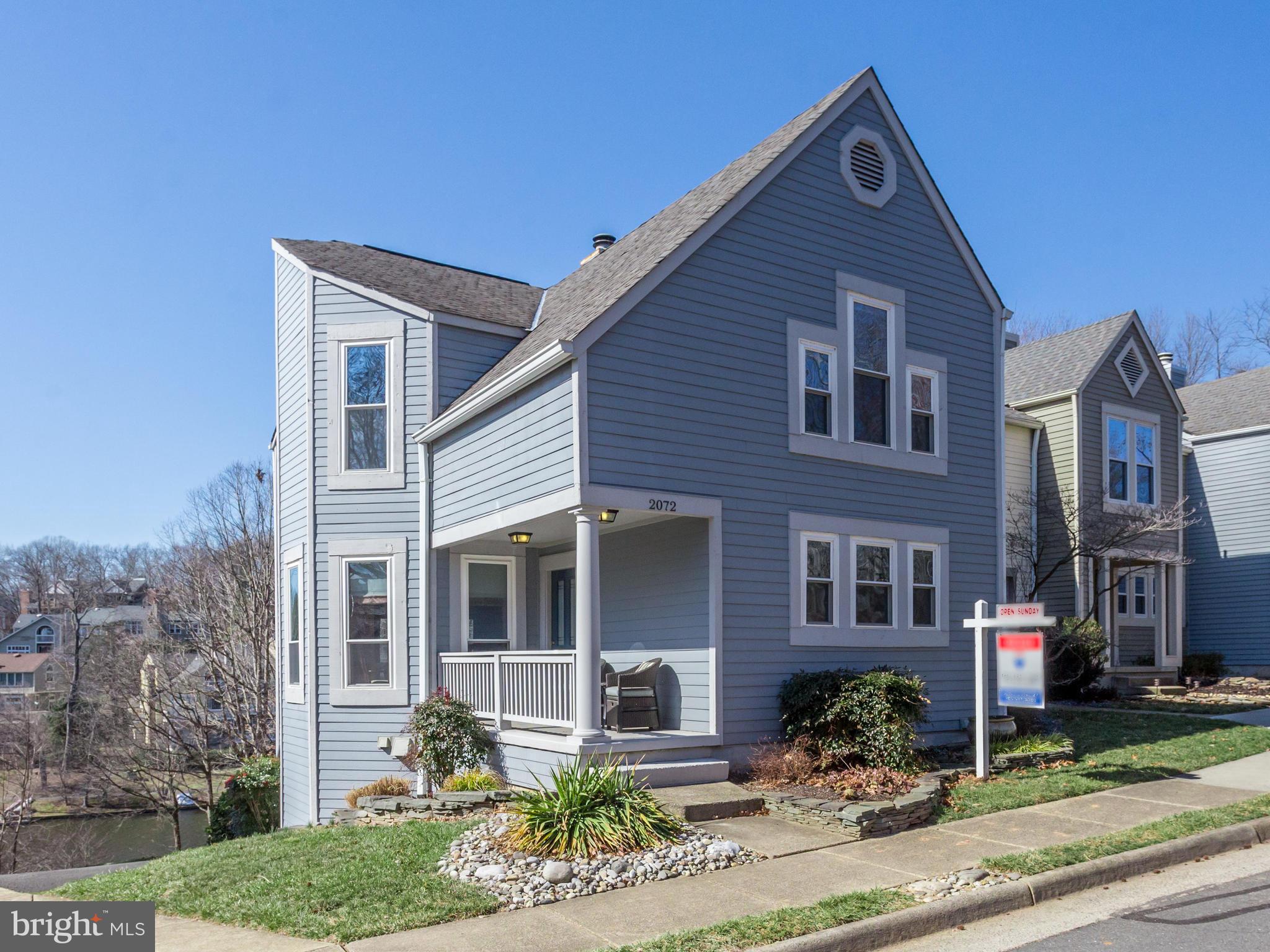 2072 Lake Audubon Court Reston, VA 20191 - Photo 2 of 30 a front view of a house with garden