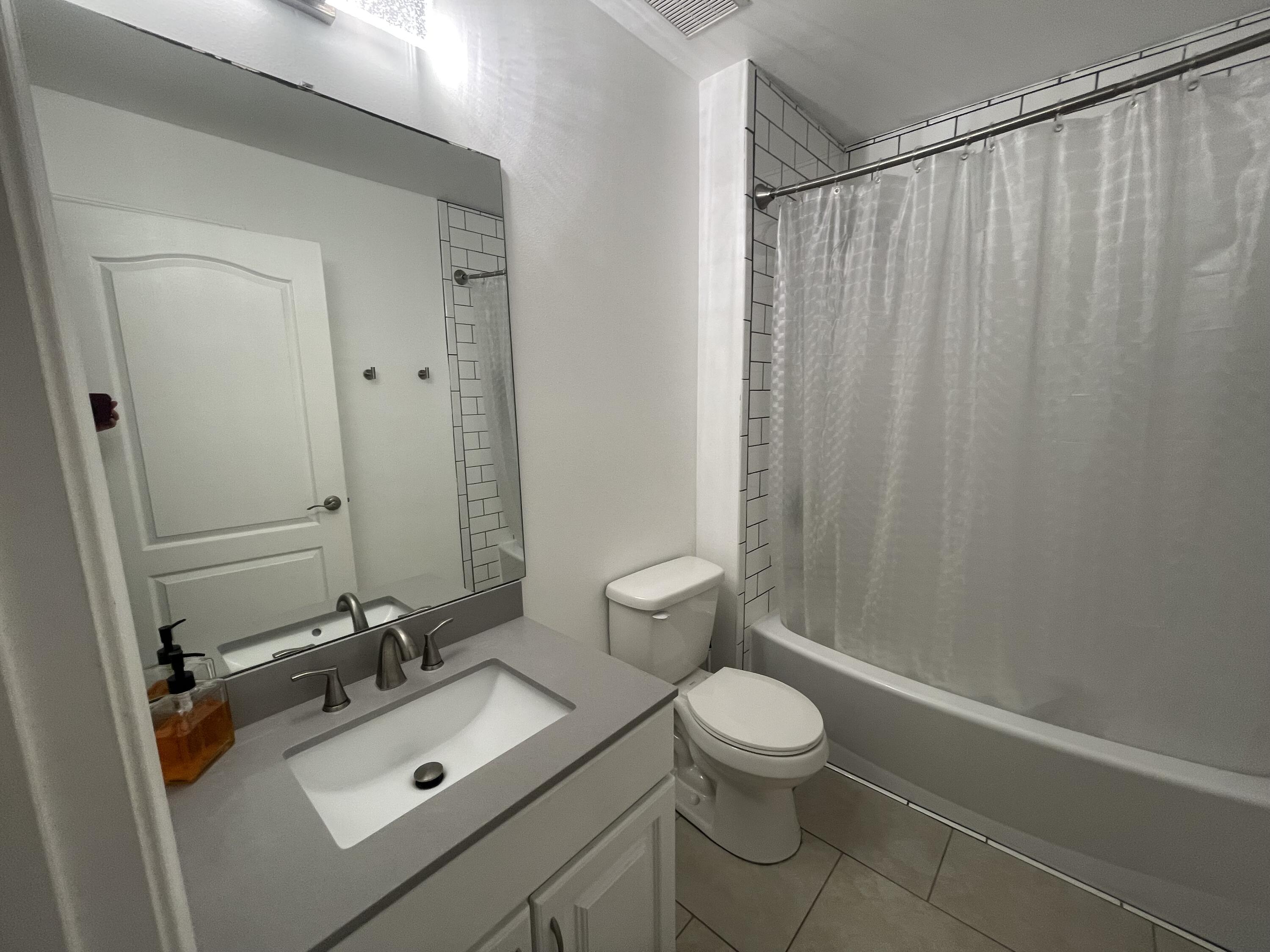 728 Riva Ridge Drive Crestview, FL 32539 - Photo 21 of 26 a bathroom with a sink a toilet and shower