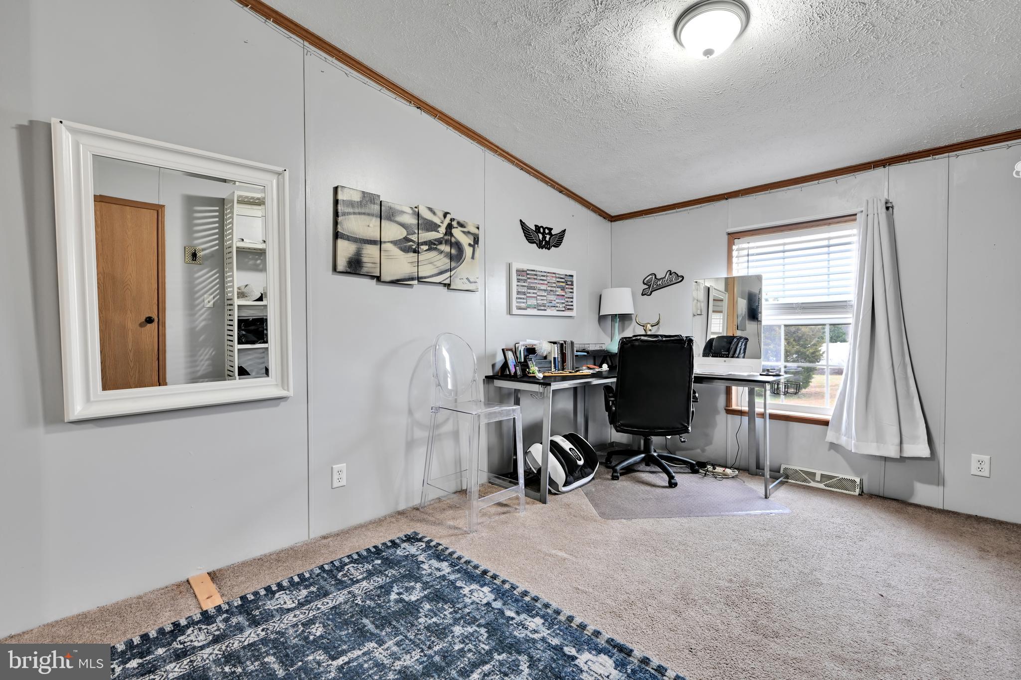 60 Bordnersville Road Jonestown, PA 17038 - Photo 27 of 45 a view of a workspace with furniture and a window
